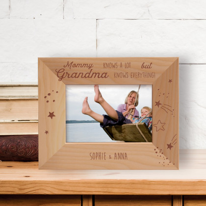 Mommy Knows A Lot But Grandma Knows Everything Personalized Wooden Frame-5" x 3 1/2" Brown Horizontal